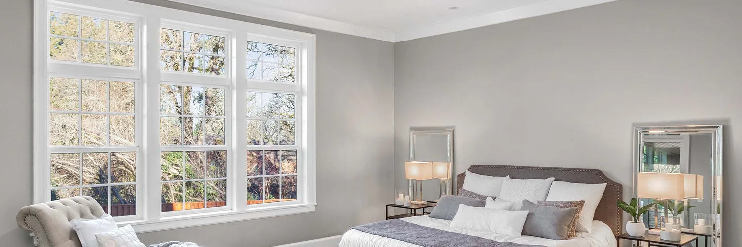 White double-hung replacement windows with optional grids